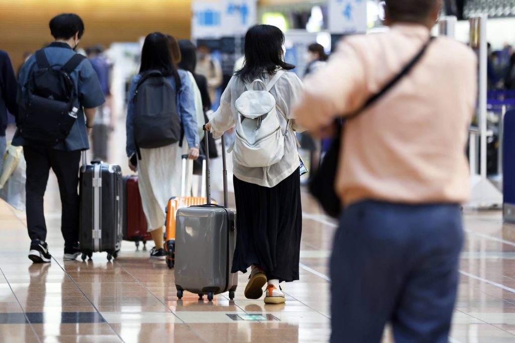Travelers at Haneda Airport as Golden Week Holidays Start