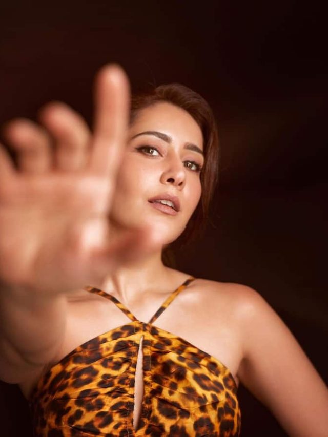 Raashi Khanna posing in a dress with a leopard print